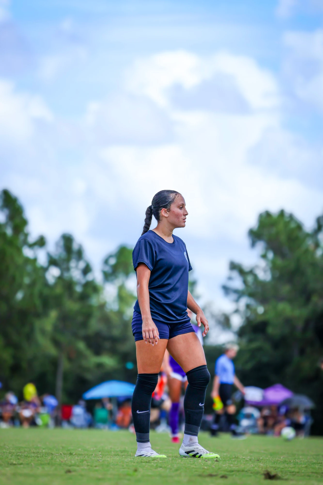 Player standing under a big sky on game day